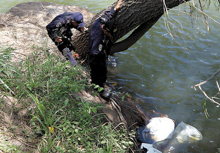 Hallan 18 cadáveres flotando en un río