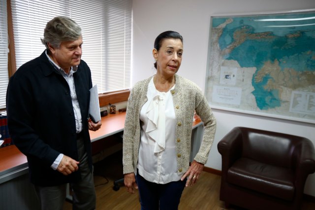 The parents of jailed opposition leader Leopoldo Lopez arrive for an interview with Reuters in Caracas