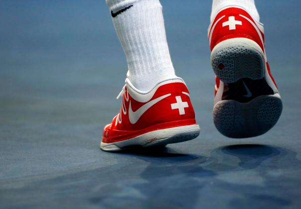 Switzerland's Roger Federer's shoes with the Swiss cross are seen during his Davis Cup semi-final tennis match against Italy's Fabio Fognini at the Palexpo in Geneva