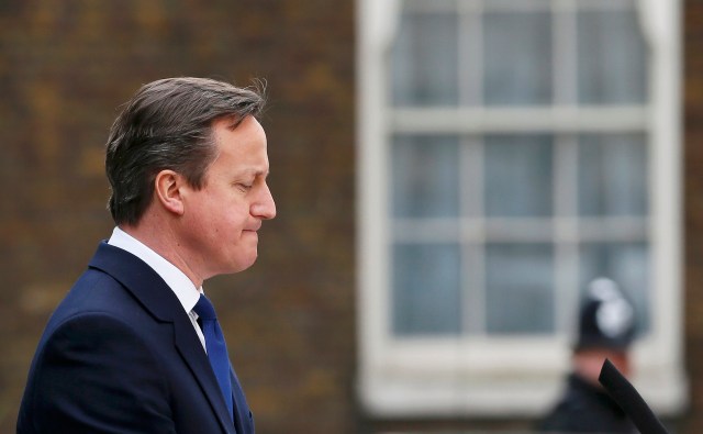 Britain's Prime Minister David Cameron speaks as he returns to Number 10 Downing Street after meeting with Queen Elizabeth in London