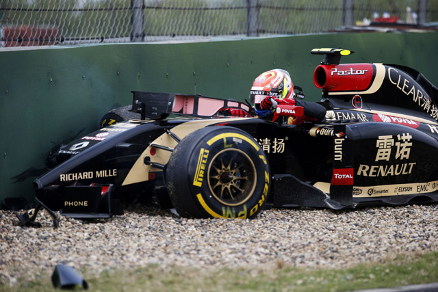 Shanghai International Circuit, Shanghai, China. Friday 18 April 2014. Pastor Maldonado, Lotus E22 Renault, climbs out of the cockpit after losing control when heading in to the pit lane and ending up in the barrier. World Copyright: Steven Tee/LAT Photographic. ref: Digital Image _L4R9097