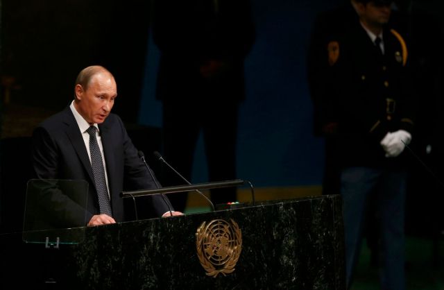 Russian President Vladimir Putin addresses attendees during the 70th session of the United Nations General Assembly at the U.N. Headquarters in New York, September 28, 2015. REUTERS/Carlo Allegri