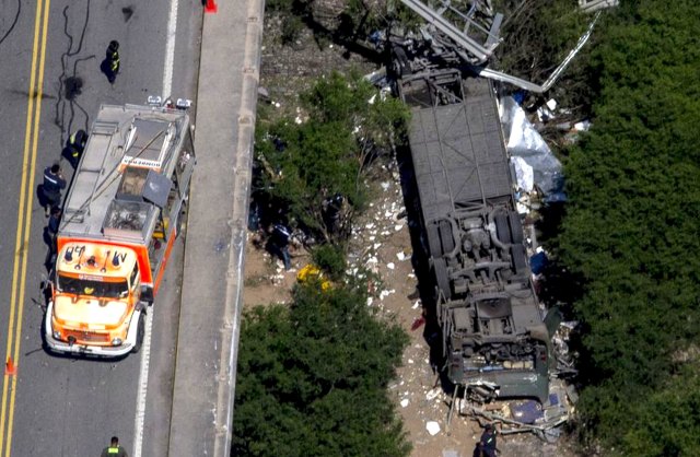 Aerial view of the overturned bus which crashed in the northern Argentina's city of Rosario de la Frontera