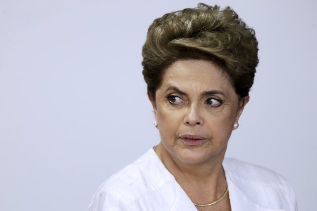 Brazil's President Rousseff looks on during signing of federal land transfer agreement for the government of the state of Amapa at Planalto Palace in Brasilia