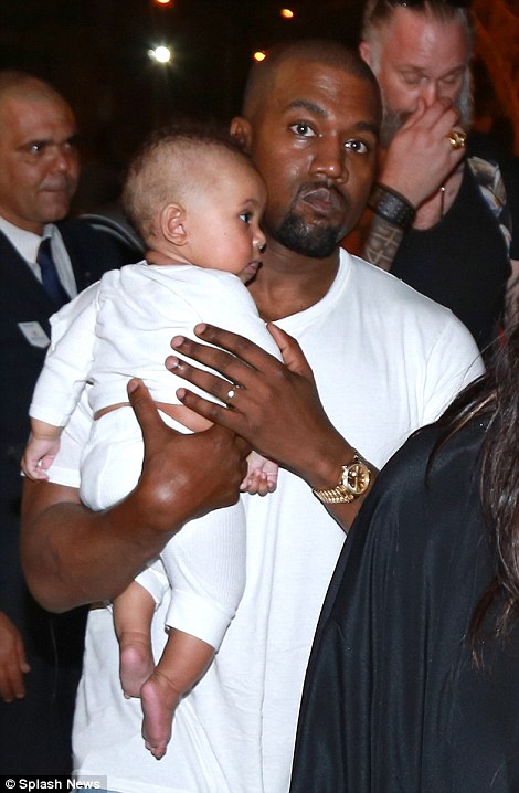 33E8AC6E00000578-3577785-Daddy_s_little_boy_Saint_West_made_his_public_debut_as_his_fathe-a-19_1462606329354