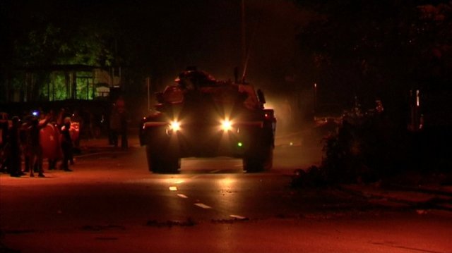 Still frame taken from amateur video obtained by Reuters on July 16, 2016 shows a tank driving past people, in Ankara, Turkey. Amateur Video/ via REUTERS TV  ATTENTION EDITORS - THIS IMAGE WAS PROVIDED BY A THIRD PARTY. EDITORIAL USE ONLY. NO RESALES. NO ARCHIVES.