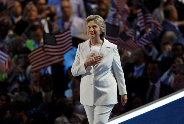 Democratic presidential nominee Hillary Clinton reacts on stage at the Democratic National Convention in Philadelphia, Pennsylvania, U.S. July 28, 2016. REUTERS/Scott Audette