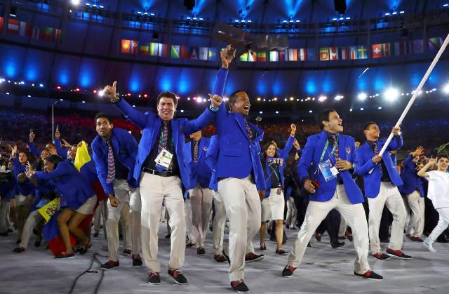 2016 Rio Olympics - Opening ceremony - Maracana - Rio de Janeiro, Brazil - 05/08/2016. Venezuela arrive in the stadium for the opening ceremony. REUTERS/Kai Pfaffenbach FOR EDITORIAL USE ONLY. NOT FOR SALE FOR MARKETING OR ADVERTISING CAMPAIGNS.