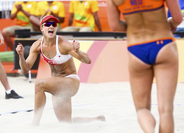 2016 Rio Olympics - Beach Volleyball - Women's Preliminary - Beach Volleyball Arena - Rio de Janeiro, Brazil - 07/08/2016. Heather Bansley (CAN) of Canada reacts. REUTERS/Ruben Sprich FOR EDITORIAL USE ONLY. NOT FOR SALE FOR MARKETING OR ADVERTISING CAMPAIGNS.