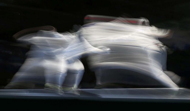 2016 Rio Olympics - Fencing - Quarterfinal - Men's Epee Team Quarterfinals - Carioca Arena 3 - Rio de Janeiro, Brazil - 14/08/2016. Daniel Jerent (FRA) of France competes with Francisco Limardo (VEN) of Venezuela. REUTERS/Issei Kato FOR EDITORIAL USE ONLY. NOT FOR SALE FOR MARKETING OR ADVERTISING CAMPAIGNS.