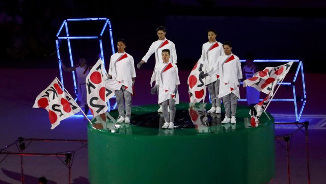 2016 Rio Olympics - Closing ceremony - Maracana - Rio de Janeiro, Brazil - 21/08/2016. Performers take part in the flag handover ceremony. The 2020 Olympics will be held in Tokyo, Japan. REUTERS/Yves Herman FOR EDITORIAL USE ONLY. NOT FOR SALE FOR MARKETING OR ADVERTISING CAMPAIGNS.