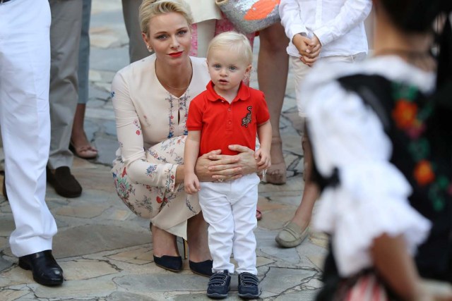 Princess Charlene of Monaco holds Prince Jacques, the heir apparent to the Monegasque throne during the traditional Monaco's picnic in Monaco, September 10, 2016. REUTERS/Valery Hache/Pool