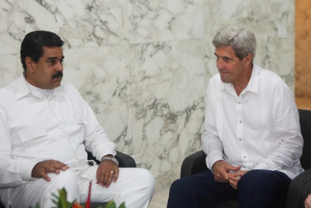 Venezuela's President Nicolas Maduro and U.S. Secretary of State John Kerry talk during their meeting in Cartagena