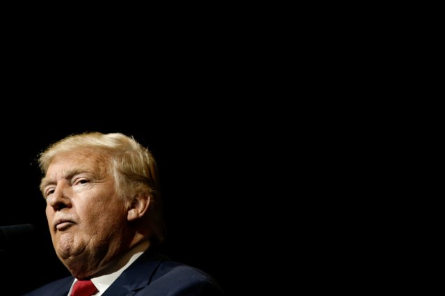 Republican U.S. presidential nominee Donald Trump pauses as he speaks to the audience at a campaign rally in West Palm Beach, Florida, U.S., October 13, 2016.   REUTERS/Mike Segar