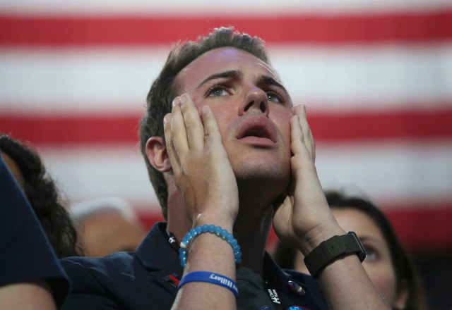 QUALITY REPEAT - A supporter of Democratic U.S. presidential nominee Hillary Clinton reacts at the election night rally the Jacob K. Javits Convention Center in New York, U.S., November 8, 2016. REUTERS/Adrees Latif