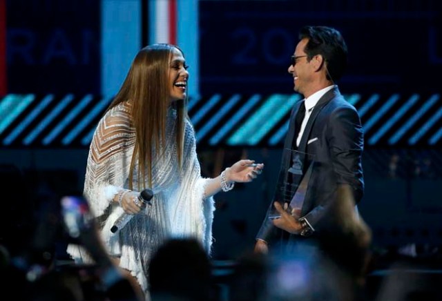 Jennifer Lopez and Marc Anthony react after kissing each other after she presented him with award honoring him as Latin Recording Academy person of the year at the 17th Annual Latin Grammy Awards in Las Vegas, Nevada, U.S., November 17, 2016.  REUTERS/Mario Anzuoni