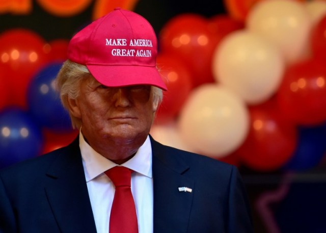 A picture taken on January 17, 2017 shows the wax statue of US President-elect Donald Trump during its presentation at the Wax Museum of Madrid. / AFP PHOTO / GERARD JULIEN