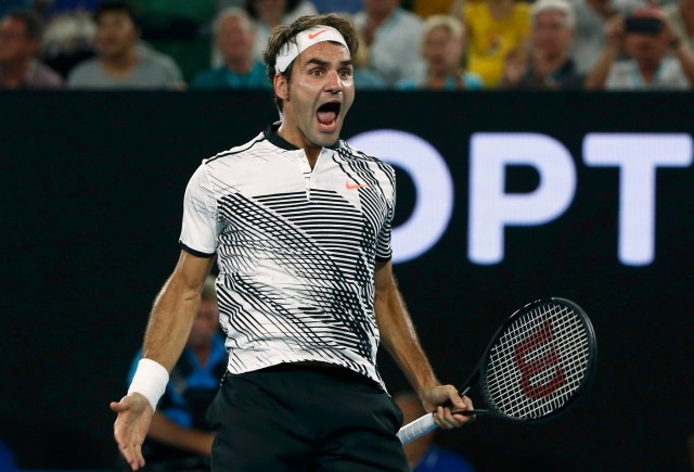 Tennis - Australian Open - Melbourne Park, Melbourne, Australia - 22/1/17 Switzerland's Roger Federer celebrates winning his Men's singles fourth round match against Japan's Kei Nishikori. REUTERS/Thomas Peter TPX IMAGES OF THE DAY