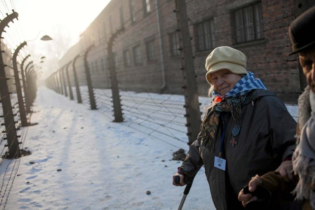 Survivors walk in the former Nazi German concentration and extermination camp Auschwitz-Birkenau in Oswiecim, Poland January 27, 2017, to mark the 72nd anniversary of the liberation of the camp by Soviet troops and to remember the victims of the Holocaust. Agency Gazeta/Kuba Ociepa/via REUTERS ATTENTION EDITORS - THIS IMAGE WAS PROVIDED BY A THIRD PARTY. EDITORIAL USE ONLY. POLAND OUT. NO COMMERCIAL OR EDITORIAL SALES IN POLAND