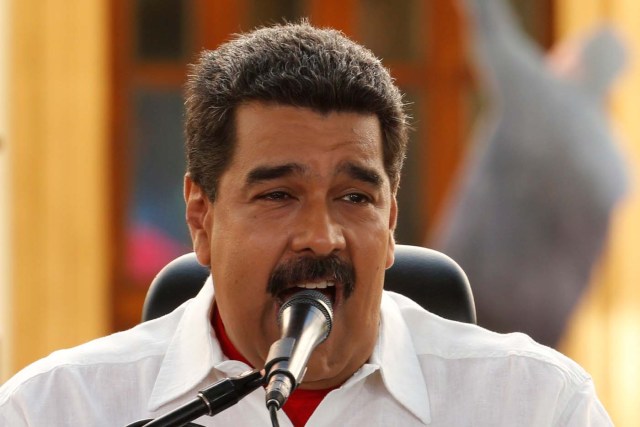 Venezuela's President Nicolas Maduro speaks during a meeting to commemorate the 18th anniversary of the arrival to the presidency of the late President Hugo Chavez at the Miraflores Palace in Caracas, Venezuela February 2, 2017. REUTERS/Carlos Garcia Rawlins