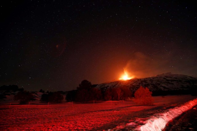 Italy's Mount Etna, Europe's tallest and most active volcano, spews lava as it erupts on the southern island of Sicily, Italy February 28, 2017. REUTERS/Antonio Parrinello     TPX IMAGES OF THE DAY