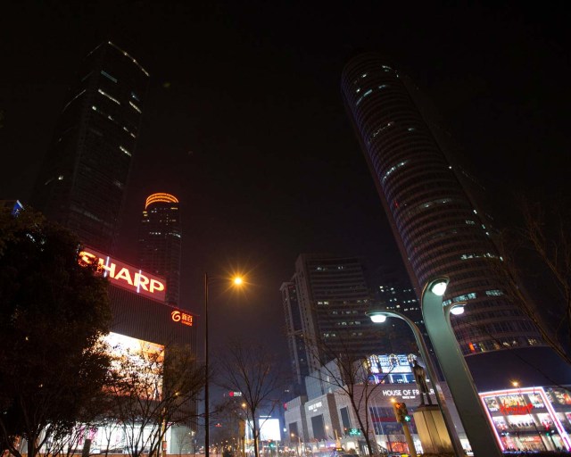 Shopping malls are seen during Earth Hour in Nanjing, Jiangsu province, China, March 25, 2017. Picture taken March 25, 2017. REUTERS/Stringer ATTENTION EDITORS - THIS IMAGE WAS PROVIDED BY A THIRD PARTY. EDITORIAL USE ONLY. CHINA OUT. NO COMMERCIAL OR EDITORIAL SALES IN CHINA.