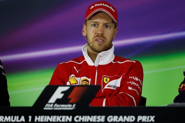 Formula One - F1 - Chinese Grand Prix - Shanghai, China - 6/4/17 - Ferrari Formula One driver Sebastian Vettel of Germany attends a press conference at the Shanghai International Circuit ahead of the Chinese F1 Grand Prix. REUTERS/Aly Song