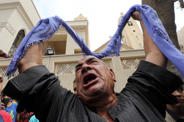 A relative of one of the victims reacts after a church explosion killed at least 21 in Tanta, Egypt, April 9, 2017. REUTERS/Mohamed Abd El Ghany