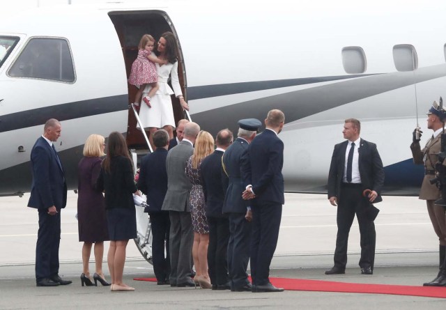 Prince William, the Duke of Cambridge, his wife Catherine, The Duchess of Cambridge and Princess Charlotte arrive at a military airport in Warsaw, Poland July 17, 2017. REUTERS/Kacper Pempel