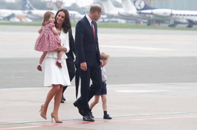 Prince William, the Duke of Cambridge, his wife Catherine, The Duchess of Cambridge, Prince George and Princess Charlotte arrive at a military airport in Warsaw, Poland July 17, 2017. REUTERS/Kacper Pempel