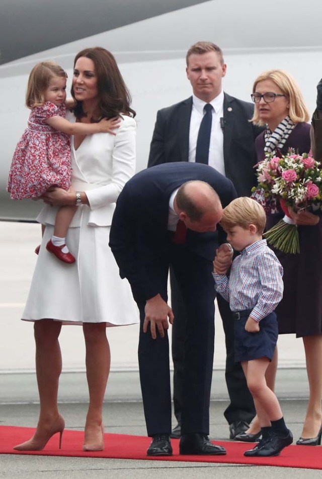 Prince William, the Duke of Cambridge, his wife Catherine, The Duchess of Cambridge, Prince George and Princess Charlotte arrive at a military airport in Warsaw, Poland July 17, 2017. REUTERS/Kacper Pempel