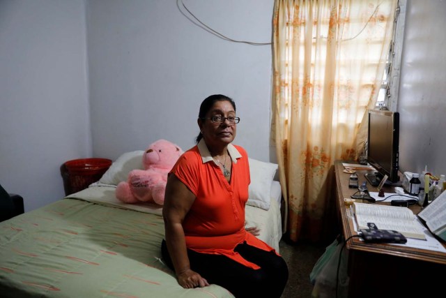 Dilcia Diaz poses for a portrait at her house in an apartment complex of Los Teques, Venezuela, July 14, 2017. Picture taken July 14, 2017. REUTERS/Andres Martinez Casares