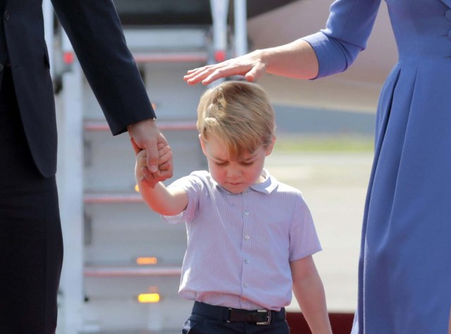 Prince William, the Duke of Cambridge, his wife Catherine, The Duchess of Cambridge, Prince George and Princess Charlotte arrive at Tegel airport in Berlin, Germany, July 19, 2017. REUTERS/Kay Nietfeld/POOL