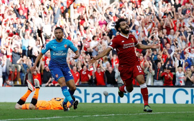 Mohamed Salah, del Liverpool, celebra tras anotar un gol.    REUTERS/Phil Noble    EDITORIAL USE ONLY. No use with unauthorized audio, video, data, fixture lists, club/league logos or "live" services. Online in-match use limited to 45 images, no video emulation. No use in betting, games or single club/league/player publications. Please contact your account representative for further details.