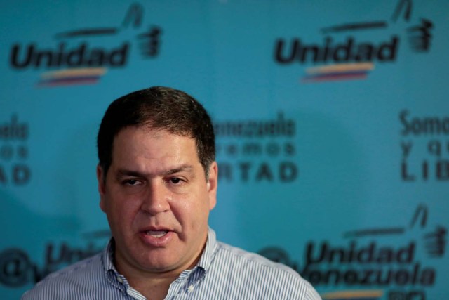 Luis Florido, lawmaker of the Venezuelan coalition of opposition parties (MUD) talks to the media during a news conference in Caracas, Venezuela, September 16, 2017. REUTERS/Marco Bello