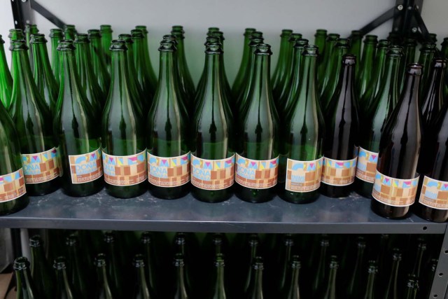 Empty bottles of craft beer Dona Barbara are seen at Cerveza Caleta brewery in Caracas, Venezuela, September 13, 2017. Picture taken September 13, 2017. REUTERS/Marco Bello