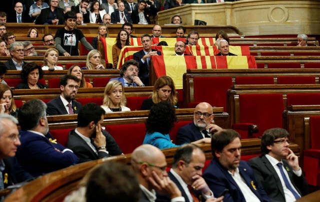 CUP leader Anna Gabriel (Top L) speaks during a plenary session at the Catalan regional Parliament in Barcelona, Spain, October 27, 2017. REUTERS/Albert Gea