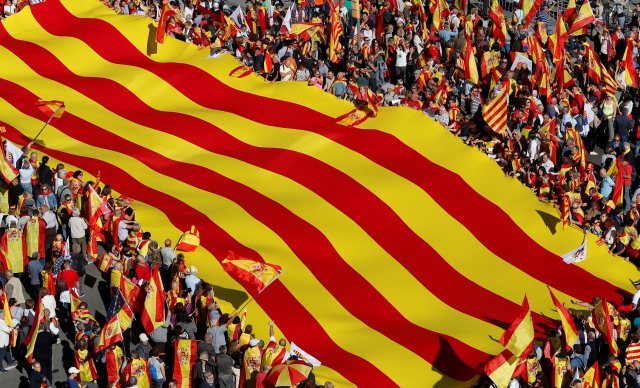 Pro-unity supporters take part in a demonstration in central Barcelona, Spain, October 29, 2017. REUTERS/Yves Herman TPX IMAGES OF THE DAY