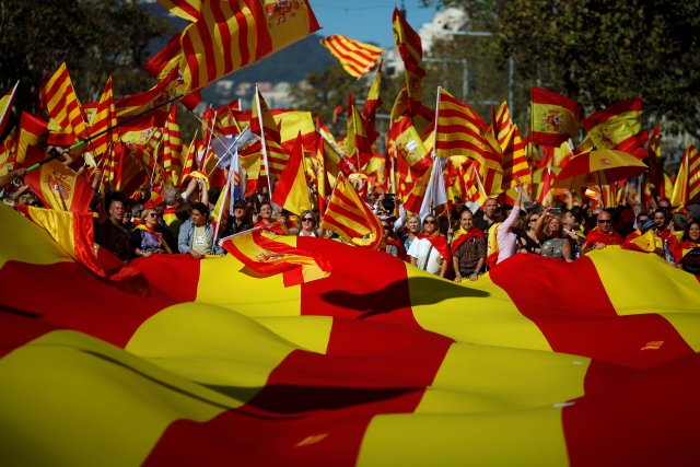 Pro-unity supporters take part in a demonstration in central Barcelona, Spain, October 29, 2017. REUTERS/Jon Nazca TPX IMAGES OF THE DAY