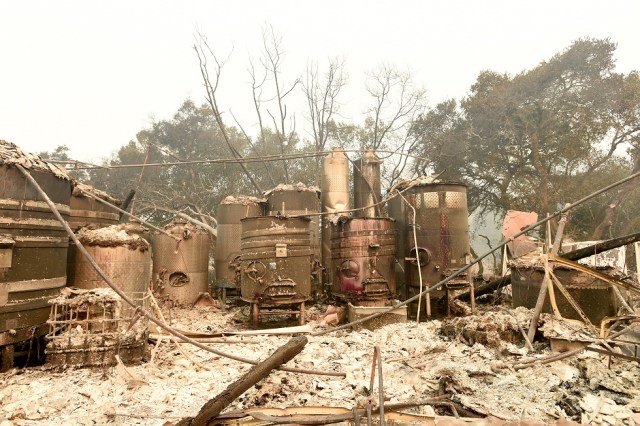 Paradise Ridge Winery is seen burned to the ground in Santa Rosa, California on October 10, 2017. Firefighters encouraged by weakening winds were battling 17 large wildfires on Tuesday in California which have left at least 13 people dead, thousands homeless and ravaged the state's famed wine country. / AFP PHOTO / JOSH EDELSON