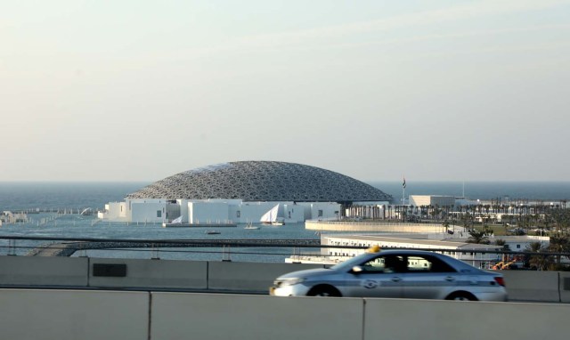 A view of the exterior of the Louvre Abu Dhabi museum on November 8, 2017. More than a decade in the making, the Louvre Abu Dhabi opens its doors today, bringing the famed name to the Arab world for the first time. / AFP PHOTO / ludovic MARIN