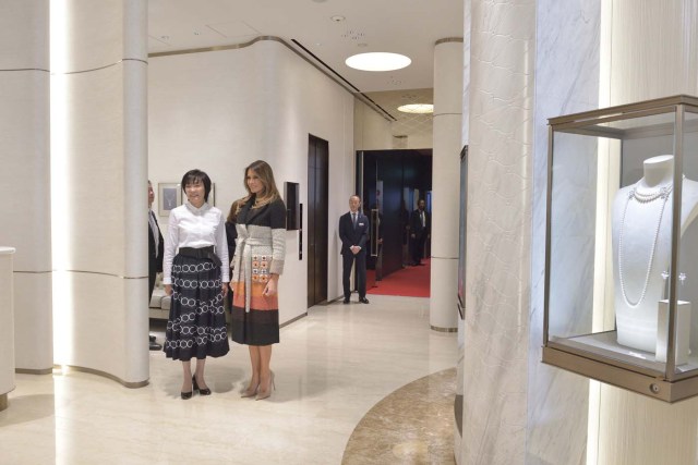 First lady of the United States Melania Trump is welcomed by Japan's First Lady Akie Abe as she arrives at Mikimoto Ginza Main Store for a cultural event in the fashionable Ginza district of Tokyo, Japan November 5, 2017. REUTERS/David Mareuil/Pool