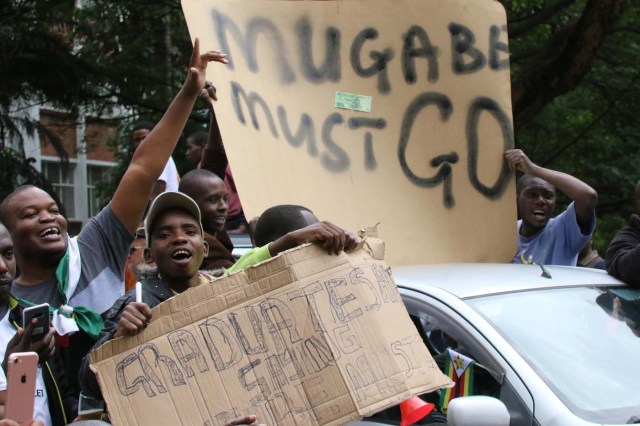 Protesters calling for Zimbabwean President Robert Mugabe to step down take to the streets in Harare, Zimbabwe, November 18, 2017. REUTERS/Philimon Bulawayo