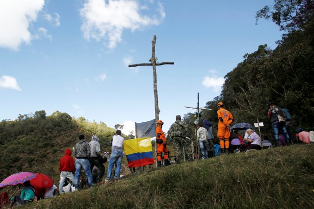 People pay tribute on the first anniversary of the plane crash where several players of the Chapecoense soccer team died, in La Union, Colombia November 28, 2017. REUTERS/Fredy Builes