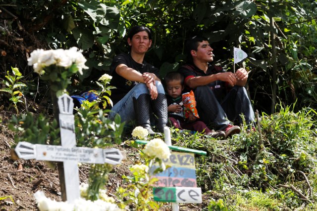 People pay tribute on the first anniversary of the plane crash where several players of the Chapecoense soccer team died, in La Union, Colombia November 28, 2017. REUTERS/Fredy Builes