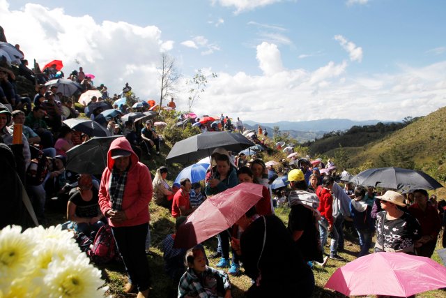 People pay tribute on the first anniversary of the plane crash where several players of the Chapecoense soccer team died, in La Union, Colombia November 28, 2017. REUTERS/Fredy Builes