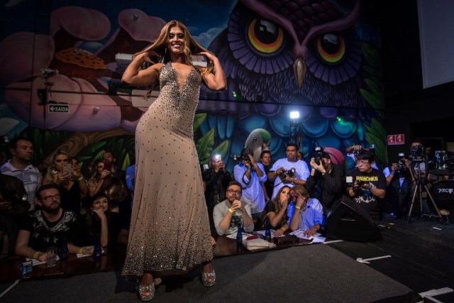 Rosie Oliveira from Amazonas poses on the catwalk during the Miss Bumbum Brazil 2017 pageant in Sao Paulo on November 07, 2017. Fifteen candidates are competing in the annual pageant to select the Brazil's sexiest female rear end. / AFP PHOTO / NELSON ALMEIDA