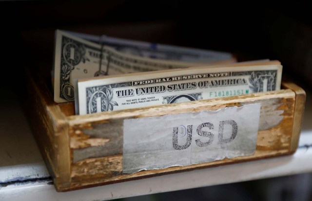 U.S. Dollar banknotes are seen in a box at the Money Service Austria company's headquarters in Vienna, Austria, November 16, 2017. REUTERS/Leonhard Foeger