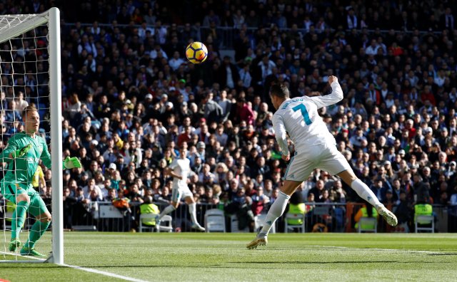 Soccer Football - La Liga Santander - Real Madrid vs FC Barcelona - Santiago Bernabeu, Madrid, Spain - December 23, 2017 Real Madrid’s Cristiano Ronaldo heads in but the goal is disallowed for offside REUTERS/Paul Hanna