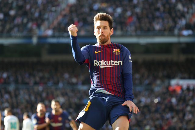 Soccer Football - La Liga Santander - Real Madrid vs FC Barcelona - Santiago Bernabeu, Madrid, Spain - December 23, 2017 Barcelona’s Lionel Messi celebrates scoring their second goal REUTERS/Sergio Perez